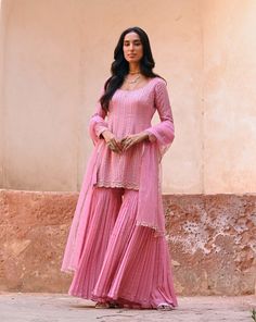 Crepe kurta with glass beads and zardozi embroidery paired with flared pants and tulle dupatta DELIVERY TIMEPlease wait 8-12 weeks for your outfit to arrive. FABRIC DETAILSCrepe, Georgette, Net Professional cleaning only.