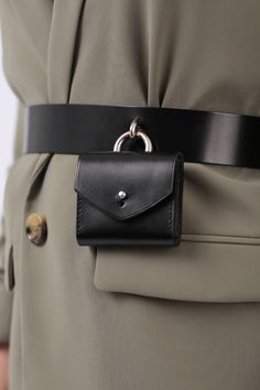 An accessory that combines fashion and functionality, the Micro Waist Belt Bag will complete your outfit in the most stylish way. The adjustable wide belt cinches the waist, giving it structure while the micro bag can hold items such as keys or other small essentials. A bold touch to your outfit, the micro bag belt can be paired with a simple dress or blazer for a statement look. Micro Bag Size: Height- 7 cm, Width- 8 cm, Depth- 1.5 cm Waist belt width: 4 cm Adjustable using the back metallic fa Tiny Bag Outfit, Tiny Bags Fashion, Waist Bag Leather, Dog Accesories, Waist Belt Bag, Tiny Bag, Micro Bag, Bag Belt, Utility Belt