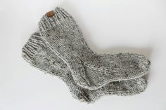 "Stay cozy in the cold weather with these hand knit Cottage Socks! These warm socks feature thick wool/acrylic blend yarn. Choose from over 30 colors! The sizing in the drop-down menu shows US shoe sizes with their approximate measurement in inches. *Colors shown in photos: Gray Marble, Pumpkin* Processing Time: This item is Made To Order and takes approximately 1 to 2 weeks to complete before it will be shipped to you. If you require a Rush Order, please message me, and I will give you a new es Cozy Knitted Socks, Warm Knit Comfortable Socks, Comfortable Warm Knit Socks, Casual Gray Knitted Socks, Cozy Chunky Knit Socks With Round Toe, Comfortable Knitted Gray Socks, Cozy Chunky Knit Socks, Cozy Handmade Socks For Stocking Stuffers, Comfortable Thick Knitted Socks