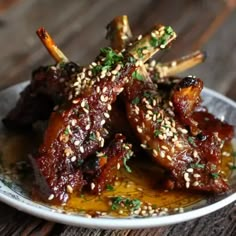 some food on a plate with sesame seeds