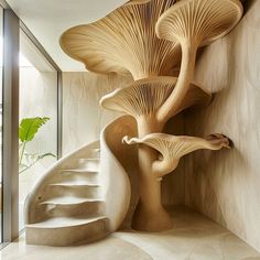 the stairs are made out of wood and have mushrooms growing on them in this modern home