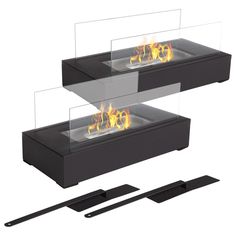 two black fire pits with glass sides and flames on each side, both facing different directions