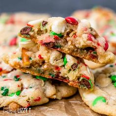 christmas cookies stacked on top of each other with green and red sprinkles