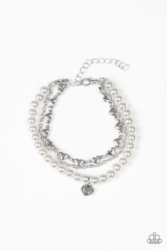 "Totally Tenderhearted" Silver Bracelet: A strand of pearly white beads, shimmery silver chains, and a row of glistening silver hearts layer around the wrist. A dainty silver heart stamped with the word, "love" swings from the beaded strand for a romantic finish. Features an adjustable clasp closure. Sold as one individual bracelet. White Pearl Bracelet, White Bracelet, Word Love, Independent Consultant, White Bracelets, Silver Chains, Paparazzi Accessories, Mean It, Affordable Jewelry