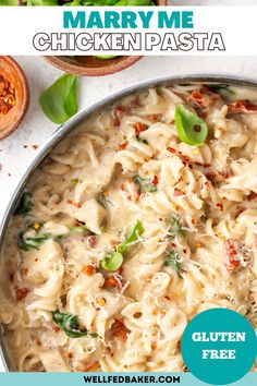 a pan filled with chicken pasta and sauce