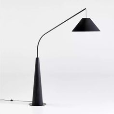 a black floor lamp on a white background