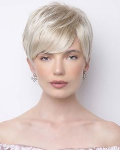 Couture Collection Hair Length: Fringe 1.97-3.35" | Crown 3.14" | Nape 1.57" Weight: 2.07 oz. Amara from our Alexander Couture Collection is a short-length synthetic wig. This straight ready-to-wear wig is a pixie cut with a stylish fringe on the side. This style has texture and a body that will give you an effortless look. Amara is machine-made with adjustable tabs in the back nape area to allow a more comfortable fit. The result is a comfortable fit with a natural look that is both fashionable Swept Fringe, Wilshire Wigs, Vivica Fox Wigs, Ponytail Hair Piece, Best Wig Outlet, Creamy Blonde, Monofilament Wigs, Side Swept, Pixie Cut Wig