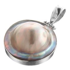 "1 1/2\" Mabe Blister Pearl In Shell Handmade 925 Sterling Silver Pendant  Beautiful mabe mother of pearl pendant set in 925 sterling silver. The mabe pearl has a perfect round shape and is set in the center of the pendant. The shell has a gorgeous silver iridescent hue.  Bail Diameter:  5mm Pendant Material:  925 sterling silver Pendant Size:  38x24mm(1 1/2x1\")w/bail Pendant Weight:  ~7 grams Shell Type:  Mabe cultured pearl" Round Cabochon Mother Of Pearl Jewelry, Silver Mother Of Pearl Round Jewelry, Silver Mother Of Pearl Jewelry With Round Shape, Silver Round Mother Of Pearl Jewelry, Silver Mother Of Pearl Necklace For Gift, Silver Mother Of Pearl Pendant Pearl Necklace, Silver Jewelry With Cabochon Mother Of Pearl, Pearl Necklace With Mother Of Pearl Round Pendant, Pearl Pendant Necklace In Mother Of Pearl