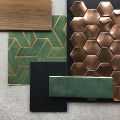 some different types of tile and wood on the ground with one green, brown, and black color scheme