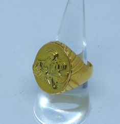 Piscatorius ring in solid yellow gold plated sterling silver. The top measures 0.90 inches tall by 0.68 inches wide This ring has a solid smooth back and weights 22 grams (0.88 oz) It comes with a velvet pouch and a shopper Anello Di San Pietro Pescatore in argento dorato 925 millesimi. L'ovale misura 23 mm x 17,50 Antique Yellow Gold Tarnish Resistant Rings, Symbolic Yellow Gold Plated Rings, Gold Signet Ring With Intaglio As A Gift, Gold Symbolic Rings For Formal Occasions, Symbolic Gold Rings For Formal Occasions, Gold 14k Signet Ring With Intaglio, Gold Signet Ring With Intaglio For Gift, Hallmarked Yellow Gold Rings In Brass, Vintage Yellow Gold Plated Signet Ring