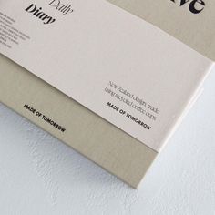 the front and back of a book on white paper with black lettering that reads brave