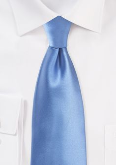 This silky, sophisticated necktie in the color periwinkle is one of the most stunning ties you could ever wish to acquire. This tie is ideal for wearing to weddings, on dates, or even to the office when you want to look a little dapper. When shopping for suits. This tie goes well with our white dress shirt, navy and white polka dot pocket square, and navy suit. We advise brown leather boots accented with a gray tie bar and coordinating cuff links to complete your look. Any man who wears ties fre Elegant Blue Tie For Business, Elegant Blue Suit And Tie Accessories For Office, Elegant Blue Neckwear For Business, Elegant Blue Office Ties, Blue Standard Tie For Formal Suit, Blue Formal Suit And Tie Accessories, Elegant Blue Ties, Classic Blue Ties For Formal Occasions, Blue Elegant Suit And Tie Accessories For Formal Occasions