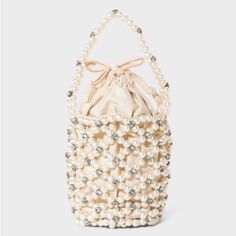 Mini Embellished Pearl Bucket Bag - A New Day Off-White Nwt More Pictures To Come Fit & Style Mini Bucket Bag Embellished With Faux Pearls And Faux Cz Accents Main Compartment With Drawstring Closure Collapsible Design Beaded Handle Product Details Fancy Up Your Bag Collection With This Mini Embellished Bucket Bag From A New Day, This Bucket Bag With A Collapsible Design Is Decorated With Off-White Faux Pearls And Sparkly Faux Cubic Zirconia Stones For A Beautiful Luxe Look. The Main Compartment Square Backpack, Envelope Purse, Mini Bucket Bag, Day Backpacks, Mini Bucket Bags, Mini Bucket, Pink Faux Fur, Target Style, Bag Collection