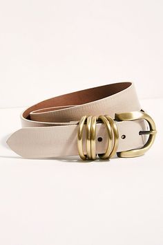 Pull things together in this classic leather belt featuring gold hardware with ring details on the side.* Rounded buckle* Adjustable fit Types Of Sunglasses, Womens Belts, Free People Store, Spring Trip, Chic Bags, Pearl Chain, Cream And Gold, Artisan Craft, Vintage Aesthetic