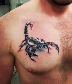 a man with a scorpion tattoo on his chest