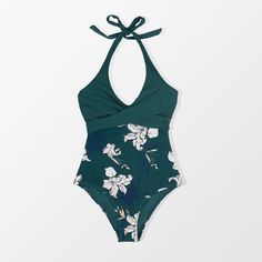 Bring beautiful floral prints to your poolside look with the Charmed Romance Criss Cross One Piece Swimsuit. The pretty one piece swimsuit features a plunging neckline halter, elegant wrap around the bust and classic coverage.
Model wearing size: XS
Height: 5' 4.5'' inches / 164 cm - Bust: 31 inches / 79 cm - Waist: 24 inches / 61 cm - Hips: 35 inches / 89 cm
DETAILS:

Item type : One piece set.
Fabric : 80% Chinlon, 20% Spandex.

Lining: 90% polyester, 10% elastane.
Clothing care : Regular wash Wrap Swimsuit, One Piece & Sets, Beach Stores, Costume Intero, Floral Wraps, Soft Cup, Clothing Care, Plunging Neckline, Criss Cross