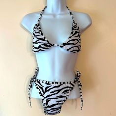 Great Little String Bikini! This Is Os. Best Fits Sizes Small - Xl. Brand New! Black Fitted Swimwear With Zebra Print, Fitted Black Zebra Print Swimwear, Fitted Zebra Print Triangle Top Swimwear, Fitted Zebra Print Swimwear For Vacation, Black Zebra Print Swimwear For Beach, Zebra Print Stretch Swimwear For Beach, Stretch Zebra Print Swimwear For Beach, Revolve Swimwear, High Waisted Swimsuit Bottoms