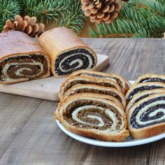 a plate that has some bread on it and pine cones in the backgroung