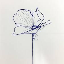 a drawing of a flower on a white background