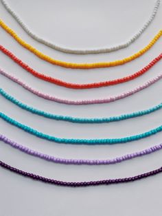 Solid colored seed bead choker necklace. Necklace includes adjustable sliding knot closure for easy tightening/loosening. Get this necklace for just $5 if purchased with another necklace! Discount is automatically added at checkout. Adjustable Sliding Knot, Seed Bead Choker, Sliding Knot Closure, Bead Choker Necklace, Bead Choker, Sliding Knot, Necklace Necklace, Beaded Choker Necklace, Light Turquoise