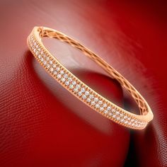 Expertly crafted with two carats of brilliant round diamonds, our Double Row Rose Gold Bangle Bracelet is a timeless accessory that can be worn alone or stacked for a striking statement. Elevate your style with the everlasting sparkle and elegance of this piece. Jewelry Style : Bangle BraceletMetal Type : 18K Rose GoldTotal Weight : 18.40 gramsDiamond Weight : 2.00 ctw round brilliant natural diamondsMeasurement : 60 mm x 50 mm Rose Gold Bangle Bracelet, Rose Gold Bangle, Diamond Bangles Bracelet, Jewelry Style, Gold Bangle Bracelet, Gold Bangle, Diamond Bangle, Timeless Accessories, Estate Jewelry