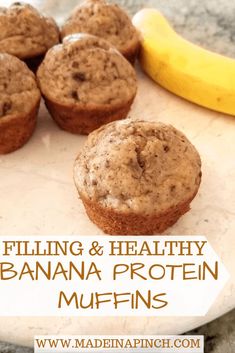 banana and healthy banana protein muffins on a plate with a banana in the background