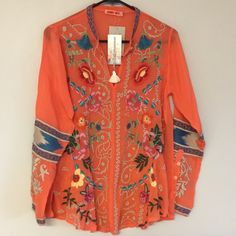 Exotically Elegant Blouse With Lush Geometric/Floral Embroidery On Front And Full Sleeves, Deep V-Neckline And Keyhole Button Front. Rayon. Machine Wash. Imported. Approx. 30"L. Sizes Xs (4) Brand New With Tags. Orange Long Sleeve Tops For Festive Season, Orange Embroidered V-neck Top, Embroidered Orange V-neck Tops, Orange Long Sleeve Blouse With Floral Embroidery, Orange Embroidered Festival Tops, Orange Blouse With Floral Embroidery, Orange Embroidered Tops For Festival, Festival-style Orange Embroidered Tops, Long Sleeve Orange Top With Floral Embroidery