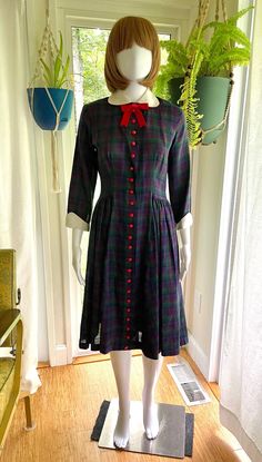 What an adorable dress! Fully button down plaid dress with a bow at the neck made by Vicky Vaughn. Material is sheer (see photos). Great vintage condition. Small stain on one sleeve cuff (see photos) Measurements (taken laying flat) Armpit to armpit 17.5" Waist 14" Shoulder to shoulder 14.5" Sleeve length 17.5" Length shoulder to hem 40.5 Dress With A Bow, Sleeve Cuff, Down Dress, Vintage Plaid, Button Down Dress, Plaid Dress, Dress Clothes For Women, Vintage Patterns, Cute Dresses