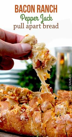 a person is taking a piece of pizza from a pan with the text bacon ranch pepper jack pull apart bread