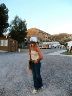 summer rodeo outfit inspo jeans sevens trucker hat country Rodeo Outfit Aesthetic, Bandana Around Neck Outfit Country, Fair And Rodeo Outfits, Rodeo Outfits Aesthetic, Rodeo Outfits Jeans, Summer Montana Outfits, Cowgirl Outfits School, Wrangler Purse Outfit, Country Street Style