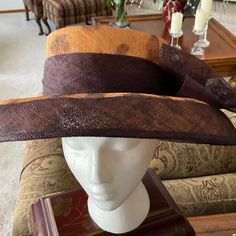 Woman’s Hat New, Never Worn Perfect Condition Multi Colors, Gold And Brown With Big Bow On Side Brown One Size Straw Hat, One Size Brown Straw Hat, Elegant Fall Beach Sun Hat, Elegant Brown Fitted Sun Hat, Elegant Fitted Brown Sun Hat, Brown Fitted Sun Hat With Short Brim, Fitted Brown Sun Hat With Short Brim, Elegant Fall Vacation Hat, Fitted Brown Sun Hat With Flat Brim