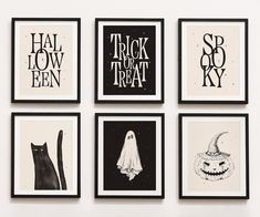 six black and white halloween prints hanging on the wall