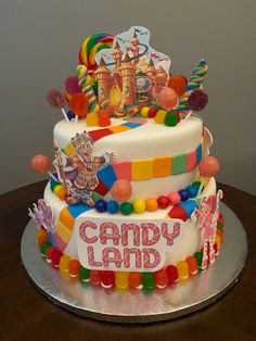 a large multi layer cake decorated with candy