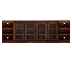 a wooden entertainment center with glass doors and shelves on one side, in dark wood