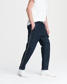 Selvedge Stripe Jean In Indigo | Men Jeans | rag & bone Classic Recycled Denim Pants With Tapered Leg, Classic Tapered Leg Pants In Recycled Denim, Selvedge Tapered Leg Jeans For Work, Classic Recycled Denim Tapered Leg Pants, Selvedge Bottoms With Straight Hem For Streetwear, Rigid Denim Jeans With Contrast Stitching And Tapered Leg, Tapered Denim Pants With Straight Hem, Tapered Leg Jeans With Contrast Stitching In Rigid Denim, Dark Wash Pants With Contrast Stitching And Tapered Leg