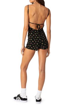 A delicate floral print decorates this stretchy cotton romper crafted with a tie-detailed open back. Square neck Adjustable straps 95% cotton, 5% spandex Machine wash, dry flat Imported Floral Print Mini Jumpsuits And Rompers For Day Out, Summer Floral Print Mini Jumpsuits And Rompers, Summer Floral Print Mini Jumpsuit Or Romper, Summer Floral Print Mini Jumpsuit, Casual Floral Print Mini Jumpsuits And Rompers, Summer Floral Print Mini Romper, Floral Print Mini Jumpsuits And Rompers For Vacation, Summer Halter Neck Jumpsuits And Rompers With Tie Back, Floral Print Mini-length Jumpsuits And Rompers For Vacation