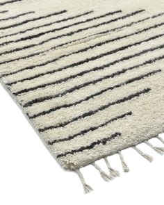 a rug with black and white stripes on it