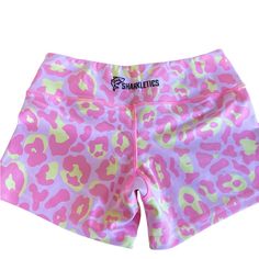 Pink And Yellow Leopard Print Workout Shorts From Sharkletics. Never Worn Yellow Bottoms For Summer Running, Yellow Athletic Shorts For Summer Training, Yellow Stretch Athletic Shorts For Yoga, Pink Biker Shorts For Training In Summer, Casual Pink Biker Shorts For Training, Yellow Summer Athletic Shorts For Training, Sporty Pink Bottoms For Cheerleading, Pink Biker Shorts For Summer Training, Summer Cheerleading Athleisure Activewear