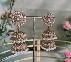 The perfect jhumka for any occasion or special gift 😍 Stunning antique gold base with sparkling clear zircon crystals and pearl detail 2.5 inch x 1 inch  Ready to ship ✨ Elegant Metal Jhumkas With Tilla, Festive Jeweled Jhumkas Gift, Festive Jeweled Jhumkas For Gift, Festive Jeweled Jhumkas Perfect For Gifts, Gold Jeweled Jhumkas As Gift, Gold Jeweled Jhumkas For Celebration, Bollywood Style Jeweled Jhumkas For Celebration, Jeweled Jhumkas For Diwali Gift, Gold Bollywood Style Bridal Earrings Jeweled