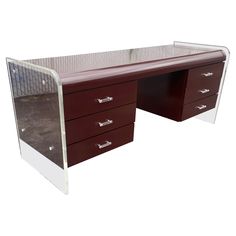 an image of a desk with drawers on it