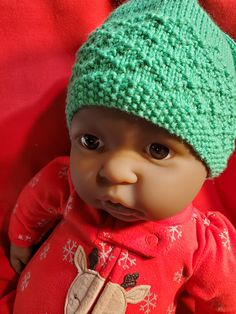 Hand knit, 55% nylon, 45% acrylic, green, patterened, baby hat.  Fits 0-3 months. Hat Fits, Doll Hat, Cross Patterns, Baby Hat, Skull Cap Beanie, Baby Patterns, Skull Cap, Baby Hats, 3 Months