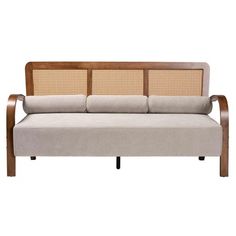 a beige couch sitting on top of a wooden frame