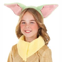 Get ready to channel the cuteness of Grogu with this officially licensed Grogu Ears Costume Headband! Based on the beloved character from the hit Star Wars series The Mandalorian, this headband is perfect for cosplay or for adding a fun touch to your Baby Yoda Halloween costume.The headband features two plush, green ears that are designed to resemble the adorable and iconic ears of Grogu, also known as Baby Yoda. The ears are attached to a sturdy plastic headband that is covered in soft fabric, Grogu Costume, Yoda Halloween Costume, Hotel Transylvania Costume, Yoda Halloween, Yoda Costume, Mandalorian Costume, Kiss Costume, Star Wars Series, Troll Costume