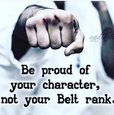 a man pointing his finger at the camera and saying be proud of your character, not your belt rank