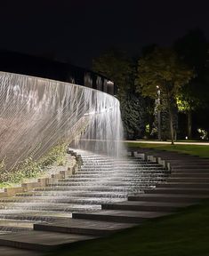 the water is running down the steps in the park