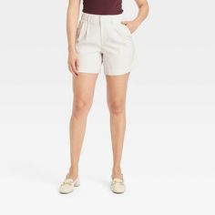 Women's High-Rise Pleat Front Shorts - A New Day™ Cream 2 Versatile Pleated Bottoms For Spring, Summer Pleated Relaxed Fit Pants, Versatile Pleated Spring Bottoms, Spring Relaxed Fit Pleated Bottoms, Beige Pleated Short Bottoms, Beige Pleated Short Length Bottoms, Relaxed Fit Daywear Shorts, Pleated Short Bottoms For Fall, Relaxed Fit Short Length Pants For Daywear