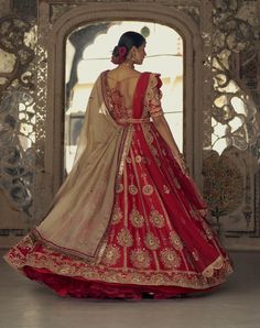 Make a striking impression in this red raw silk lehenga choli, complemented by a net dupatta embroidered in gold dori and highlighted with dabka, beads, sequins, and crystals. It comes with a second beige dupatta and belt. Silk Lehenga Choli, Raw Silk Lehenga, Embroidered Lehenga, Silk Lehenga, Net Dupatta, Red Fabric, Lehenga Choli, Raw Silk, Passion For Fashion