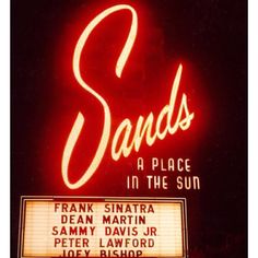 the sands sign in las vegas is lit up with red neons and words on it