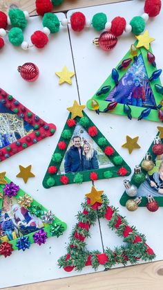 christmas tree ornaments are arranged on a table