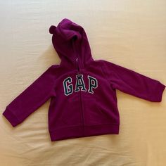 Never Worn Baby Gap Zip-Front Hoodie Unisex Made In Vietnam 12-18 Months Cotton & Polyester Blend Adjustable Hood Hoodie For Playtime In Fall, Pink Gap Sweatshirt For Winter, Gap Pink Winter Hoodie, Winter Hoodie Sweatshirt For Playtime, Winter Hooded Sweatshirt For Playwear, Hooded Winter Sweatshirt For Playwear, Hooded Winter Outerwear For Playwear, Cute Gap Cotton Outerwear, Cute Cotton Outerwear By Gap